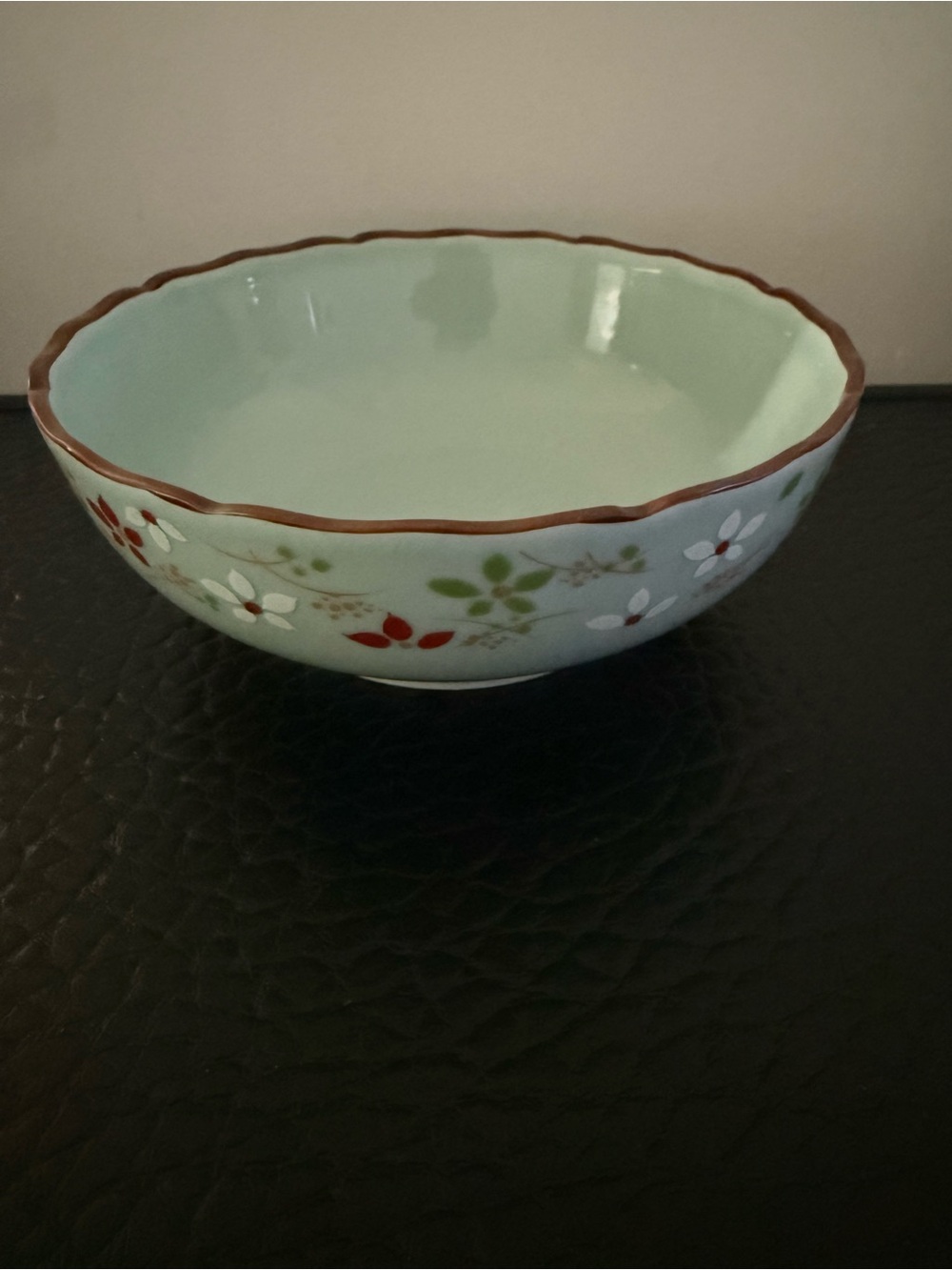 Light Aqua Floral Ceramic Bowl with Brown Rim